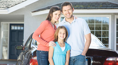 Smiling family of three - Learn more about the Insurance Products and Services we offer